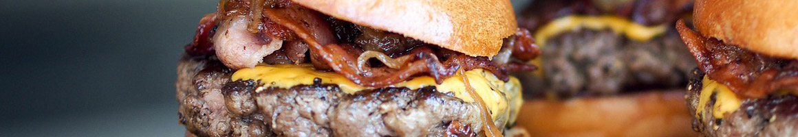 Eating Burger at Rockin' BZ Burgers restaurant in Alamogordo, NM.